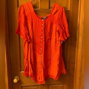 Bright orange button up blouse